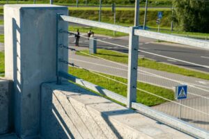 modern metal fence made metal profiles cables connection fastening iron cables with steel turnbuckles metal fastening two steel rope fencing around perimeter roof 678914 6732